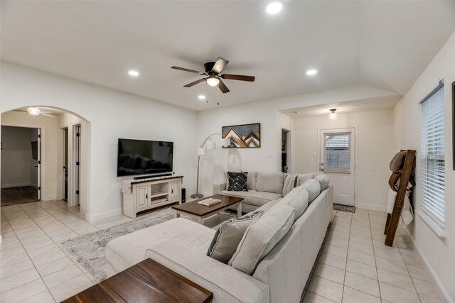 2282 Torch Lake Dr, Forney, TX 75126 - living area featuring light tile patterned flooring, baseboards, recessed lighting, a ceiling fan, and arched walkways