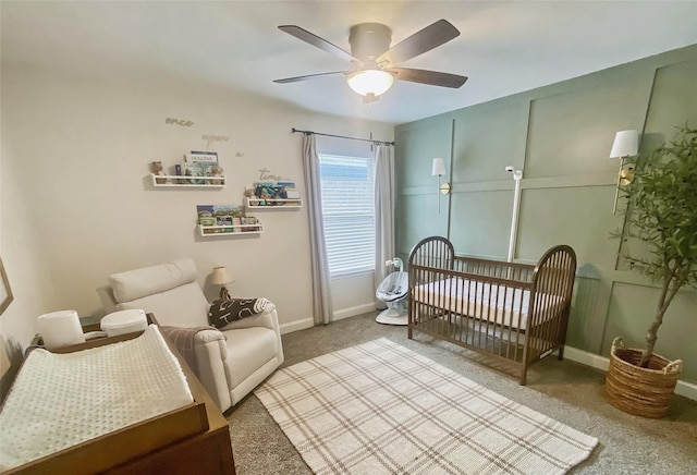 2282 Torch Lake Dr, Forney, TX 75126 - bedroom featuring carpet flooring, baseboards, a nursery area, and ceiling fan