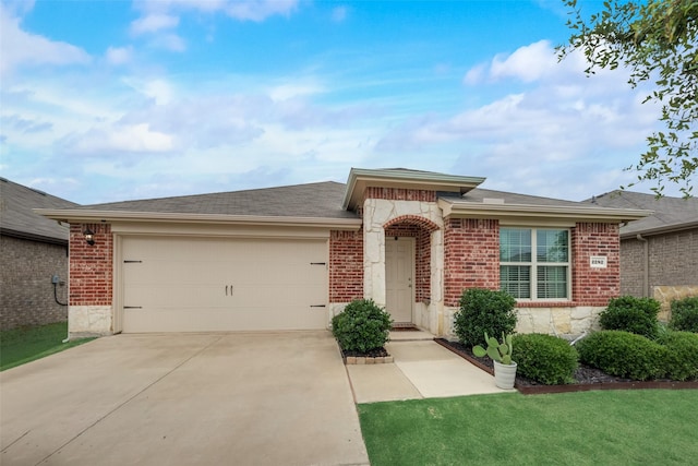 2282 Torch Lake Dr, Forney, TX 75126 - ranch-style home featuring a front yard, roof with shingles, concrete driveway, an attached garage, and brick siding