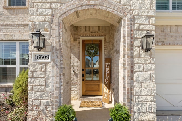 16509 Hidden Cove Dr, Celina, TX 75009 - doorway to property with stone siding and brick siding