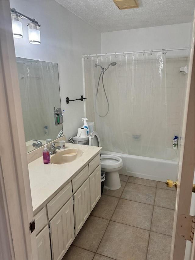 901 Freestone Ct, Arlington, TX 76017 - full bathroom featuring vanity, toilet, a textured ceiling, tile patterned floors, and shower / bath combo with shower curtain
