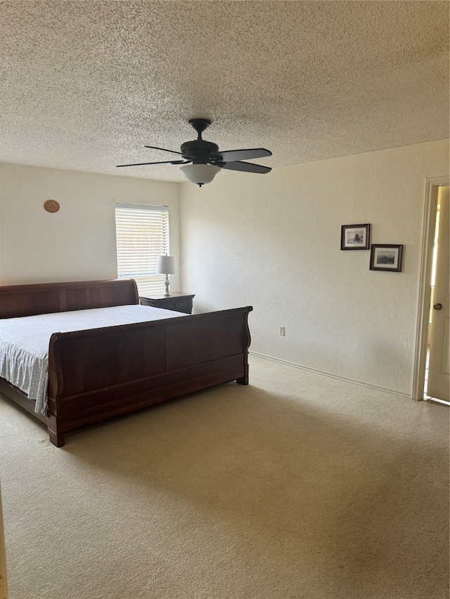 901 Freestone Ct, Arlington, TX 76017 - unfurnished bedroom with a textured wall, carpet, a textured ceiling, and ceiling fan