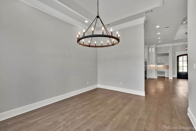 1113 Forest Trail Dr, Shreveport, LA 71106 - spare room with a chandelier, ornamental molding, recessed lighting, and dark wood-style floors