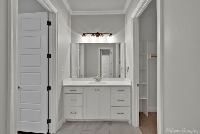 1113 Forest Trail Dr, Shreveport, LA 71106 - bathroom with crown molding, vanity, a spacious closet, and marble finish floors