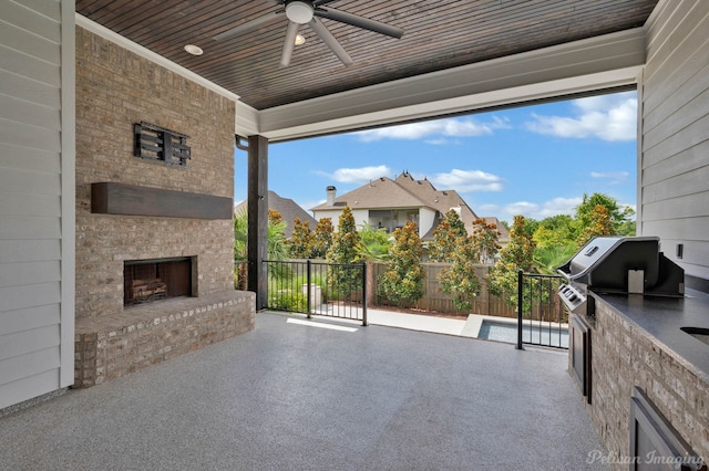 1113 Forest Trail Dr, Shreveport, LA 71106 - view of patio with an outdoor brick fireplace, an outdoor kitchen, and a ceiling fan