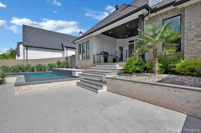 1113 Forest Trail Dr, Shreveport, LA 71106 - view of patio featuring a ceiling fan and exterior kitchen