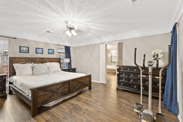 bedroom with a textured ceiling, wood finished floors, crown molding, ceiling fan, and connected bathroom