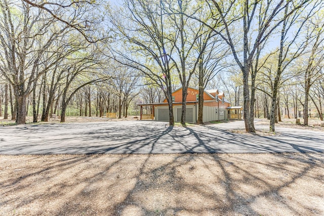 exterior space with an attached garage and driveway