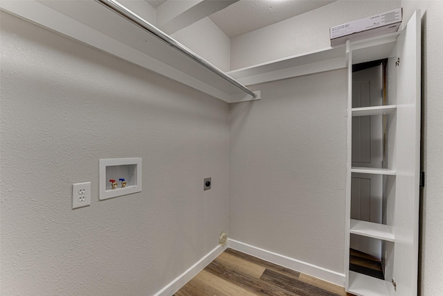 washroom with laundry area, wood finished floors, hookup for an electric dryer, washer hookup, and baseboards