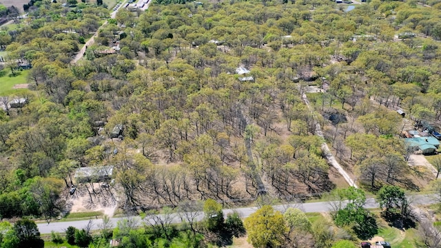 drone / aerial view with a view of trees