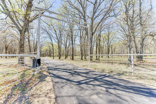 view of road featuring a gate
