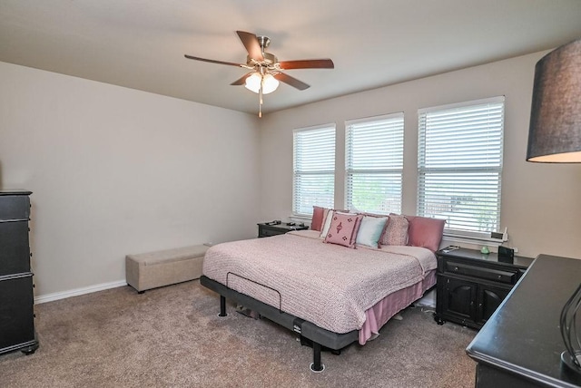 201 Virginia Ln, Hickory Creek, TX 75065 - carpeted bedroom featuring baseboards and a ceiling fan