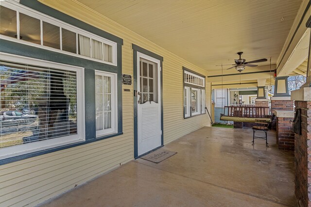 view of patio / terrace featuring a ceiling fan and a porch