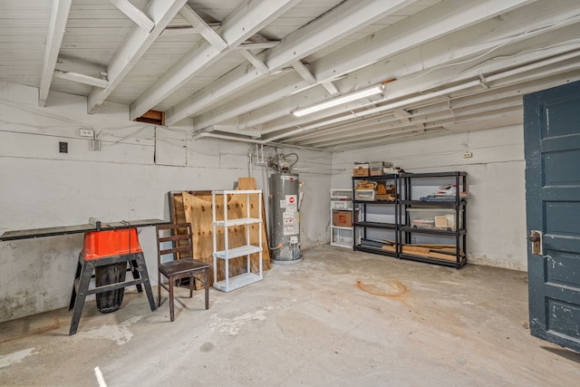 unfinished below grade area featuring gas water heater