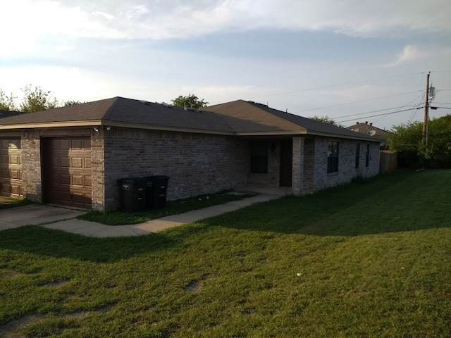 8124 Doreen Ave, Fort Worth, TX 76116 - view of property exterior with an attached garage, brick siding, and a yard