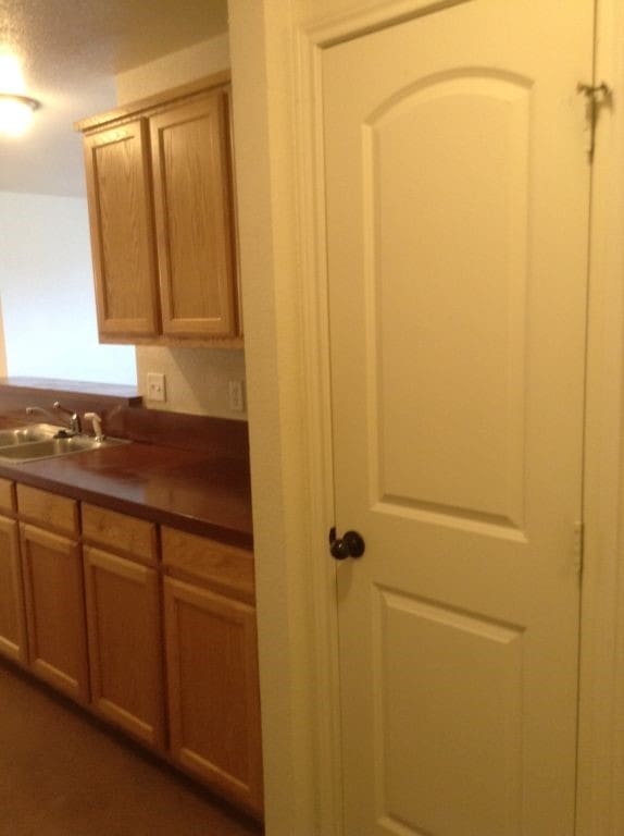 8124 Doreen Ave, Fort Worth, TX 76116 - kitchen with a sink and dark countertops