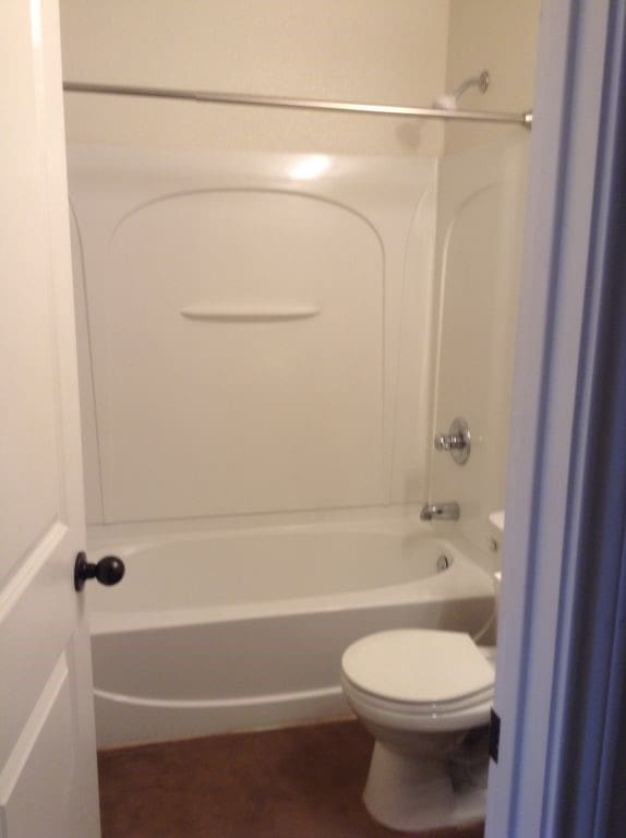 8124 Doreen Ave, Fort Worth, TX 76116 - bathroom with shower / bathing tub combination and toilet