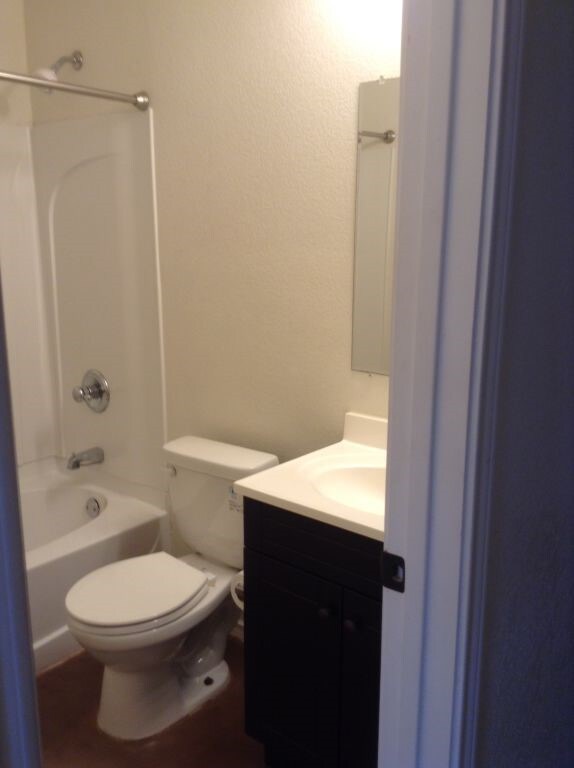 8124 Doreen Ave, Fort Worth, TX 76116 - full bathroom with toilet, shower / tub combination, and vanity