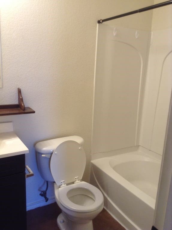 8124 Doreen Ave, Fort Worth, TX 76116 - full bath with toilet, vanity, and shower / tub combination
