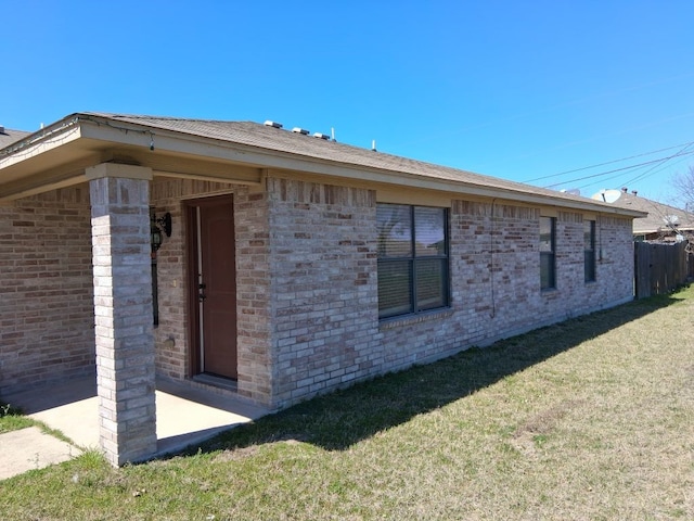 8124 Doreen Ave, Fort Worth, TX 76116 - view of property exterior featuring a lawn and brick siding