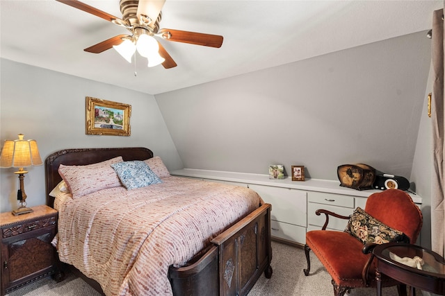 bedroom with ceiling fan and light carpet