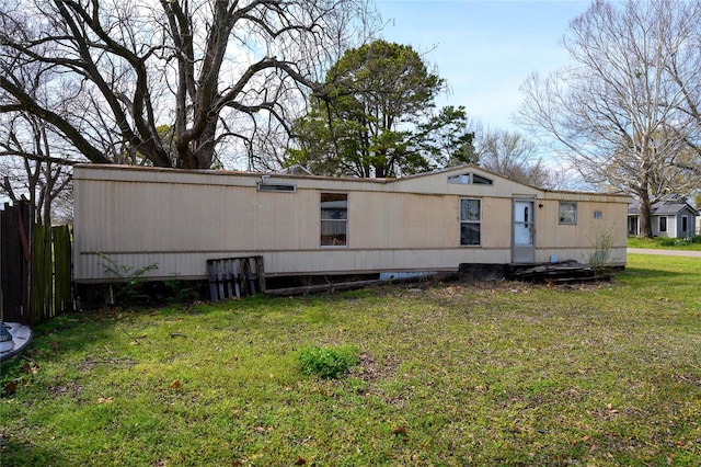 210AND218 N Collins, Colbert, OK 74733 - view of side of home featuring a yard