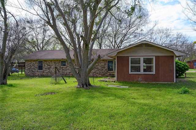 210AND218 N Collins, Colbert, OK 74733 - rear view of property featuring a yard