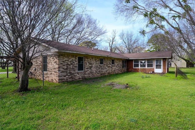 210AND218 N Collins, Colbert, OK 74733 - rear view of house featuring brick siding, fence, and a yard