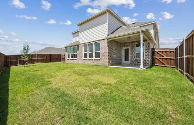 4376 Noble Ln, Midlothian, TX 76065 - rear view of house with brick siding, roof with shingles, and a patio area