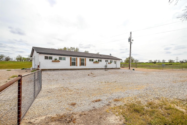 view of front of house with fence