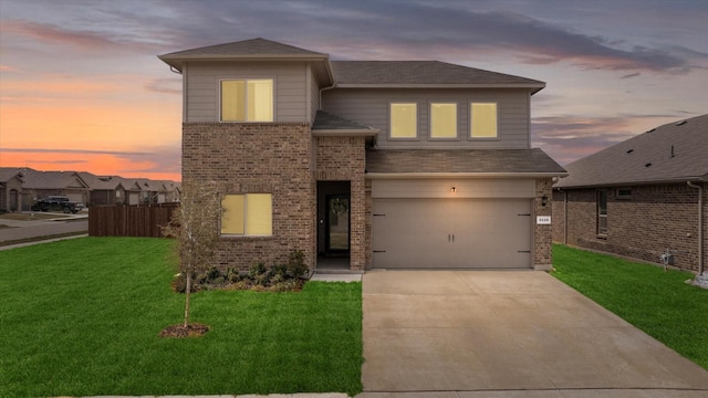 5228 Star Bright Dr, Fort Worth, TX 76179 - view of front of property featuring concrete driveway, an attached garage, brick siding, a shingled roof, and a lawn