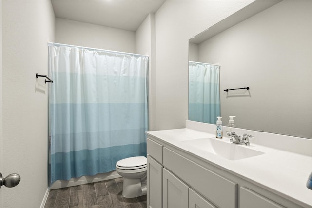 5228 Star Bright Dr, Fort Worth, TX 76179 - full bathroom with curtained shower, toilet, wood finish floors, and vanity