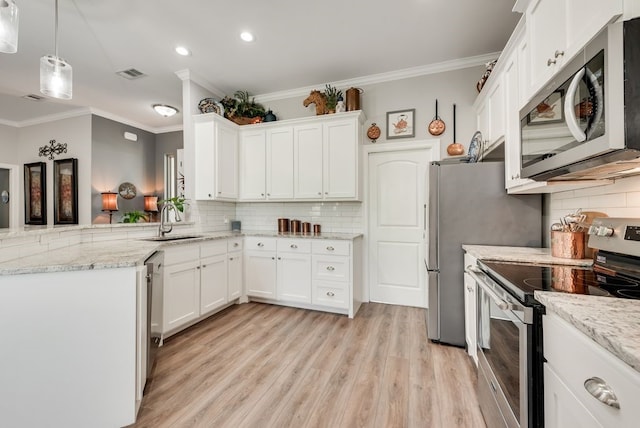 199 Pearl Valley Dr, Kerens, TX 75144 - kitchen featuring white cabinetry, a sink, light wood-style floors, visible vents, and appliances with stainless steel finishes