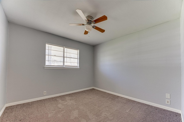 1805 Austin Dr, Kaufman, TX 75142 - spare room with carpet floors, baseboards, and a ceiling fan
