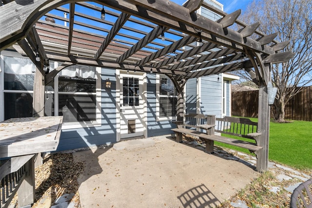 view of patio / terrace with fence and a pergola