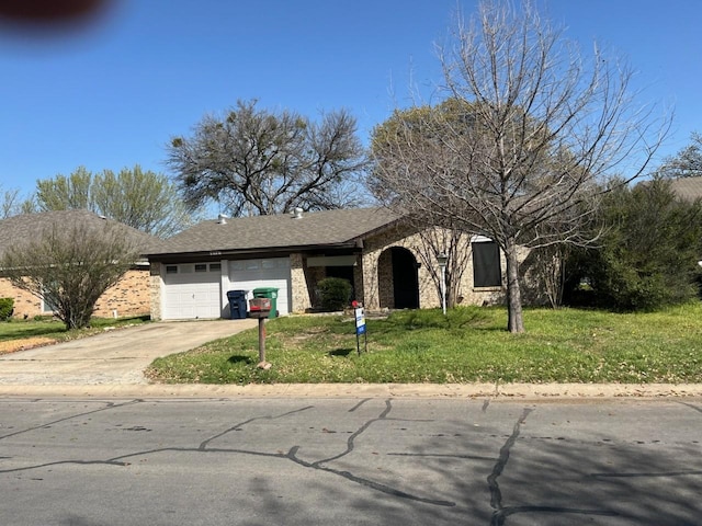 1717 Oak Tree Dr, Denton, TX 76209 - ranch-style home with a front yard, a garage, concrete driveway, and brick siding