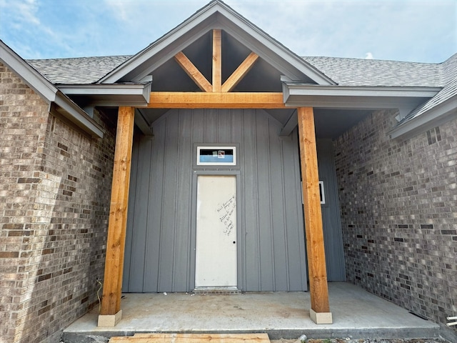 1005 Ronnie Ct, Springtown, TX 76082 - entrance to property featuring roof with shingles and brick siding