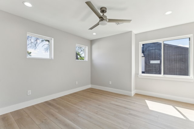 4513 Lakecrest Dr, The Colony, TX 75056 - spare room featuring light wood-style floors, ceiling fan, recessed lighting, and baseboards