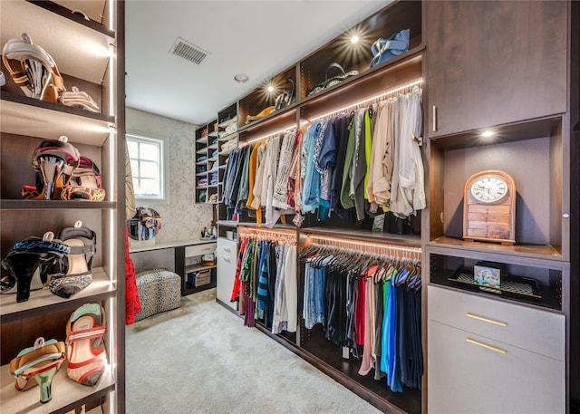 walk in closet with carpet and visible vents