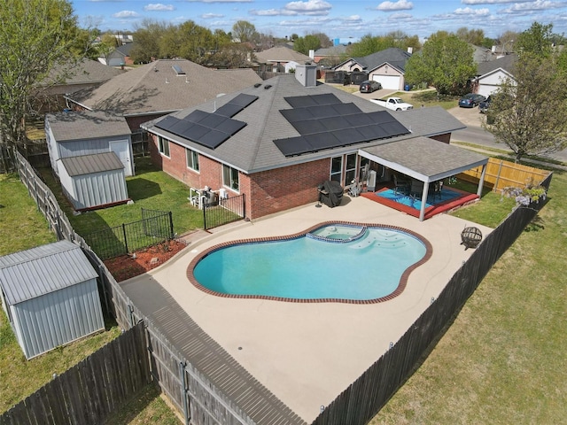 1008 Miles Ave, Burleson, TX 76028 - view of swimming pool with a patio, a residential view, an outdoor structure, a storage unit, and a pool with connected hot tub