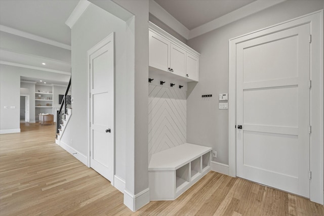909 Saint Anne Ct, Heath, TX 75032 - mudroom featuring light wood finished floors, baseboards, ornamental molding, recessed lighting, and built in shelves