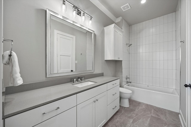909 Saint Anne Ct, Heath, TX 75032 - full bathroom with toilet, vanity, shower / washtub combination, and marble look tile flooring