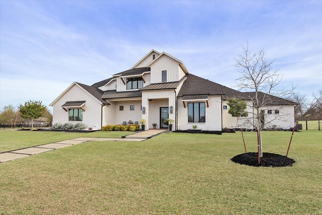 909 Saint Anne Ct, Heath, TX 75032 - modern farmhouse style home with a standing seam roof, a front yard, and metal roof