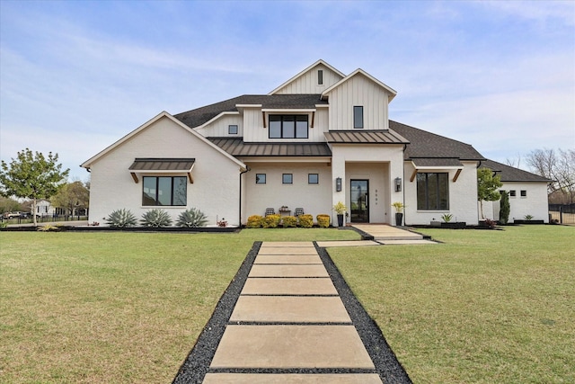 909 Saint Anne Ct, Heath, TX 75032 - modern farmhouse style home featuring a standing seam roof, a front lawn, board and batten siding, metal roof, and roof with shingles
