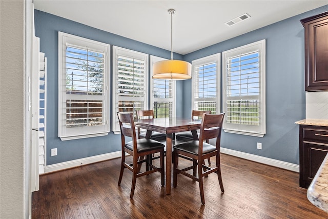 1630 Old Oak Ct, Prosper, TX 75078 - dining room with dark wood finished floors and healthy amount of natural light