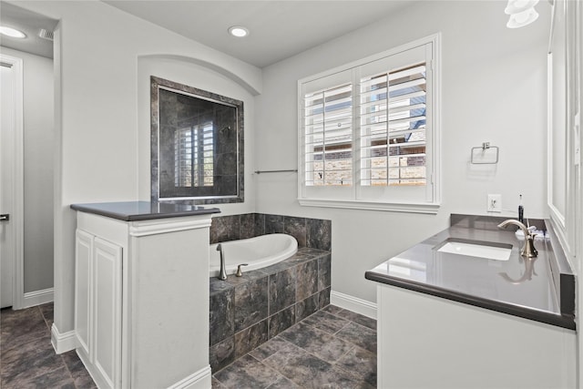 1630 Old Oak Ct, Prosper, TX 75078 - full bath featuring healthy amount of natural light, baseboards, a bath, vanity, and recessed lighting