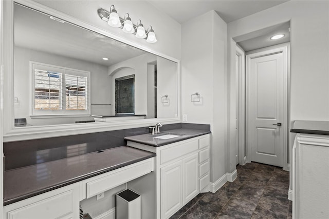 1630 Old Oak Ct, Prosper, TX 75078 - bathroom featuring vanity and stone finish flooring