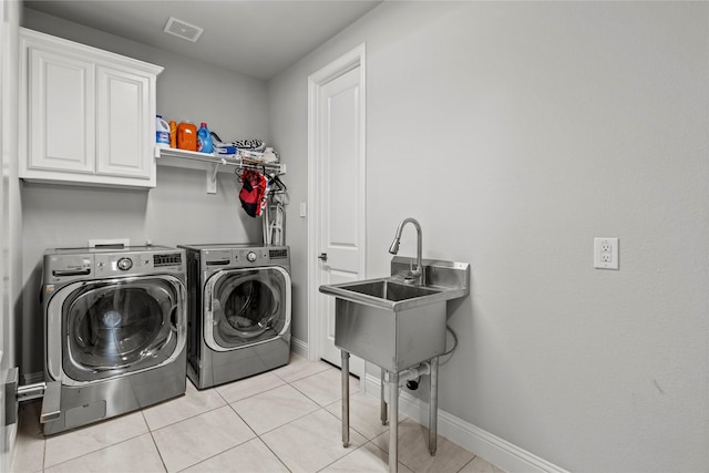 1630 Old Oak Ct, Prosper, TX 75078 - laundry room featuring cabinet space, washer and dryer, and light tile patterned floors