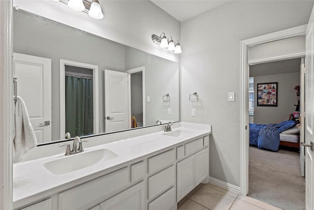 1630 Old Oak Ct, Prosper, TX 75078 - ensuite bathroom featuring double vanity and tile patterned flooring