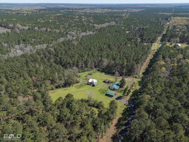 aerial view featuring a forest view